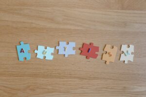 puzzle pieces with cutout letters